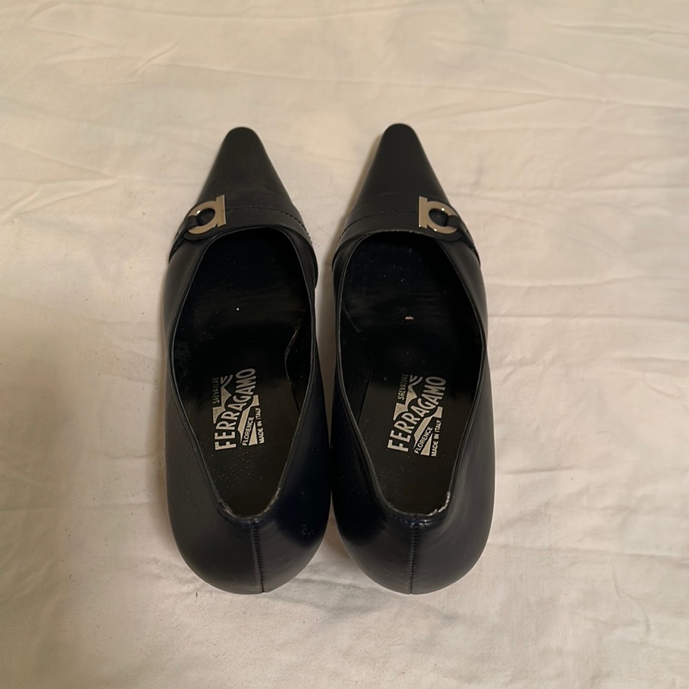 Shoes with metal Ferragamo logo